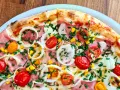 Ile cm ma duża pizza w Pizza Hut? Zaskakujące wymiary i porady