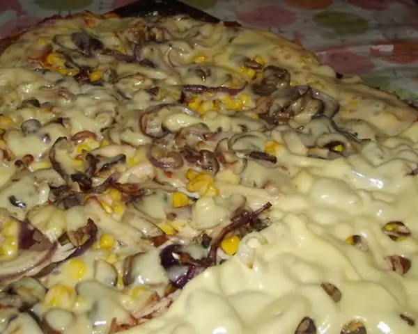 Ile drożdży na 1 kg mąki pizza, aby uniknąć zakalca w cieście?